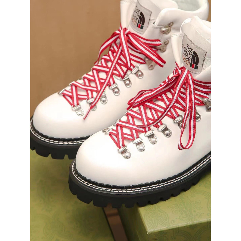 G*u*i x the north face leather ankle boots white