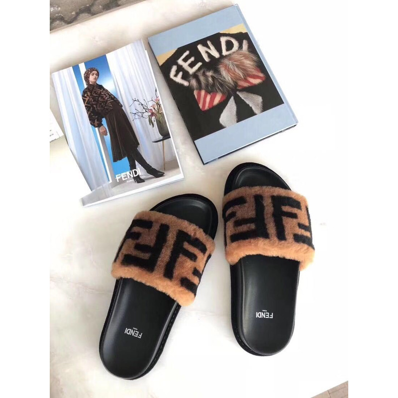 F**di brown leather and wool slide