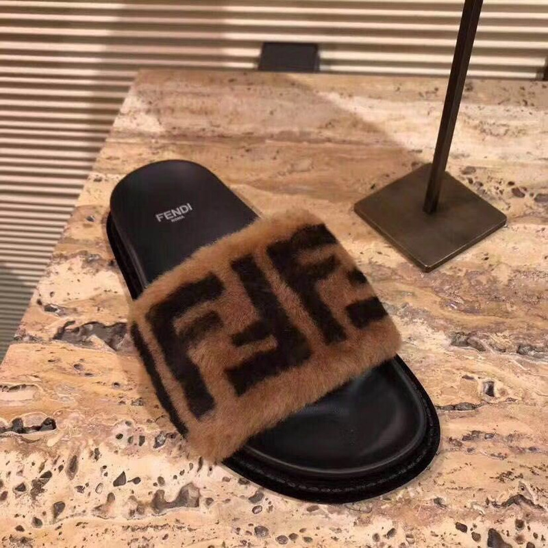 F**di brown leather and wool slide