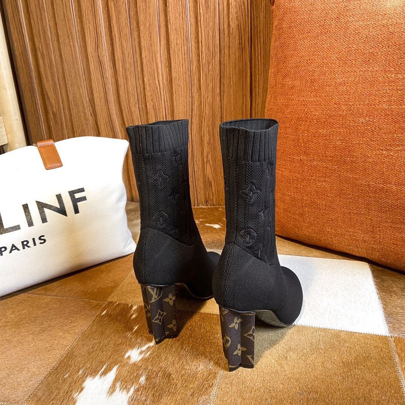 l**is V*t*n silhouette ankle boots black