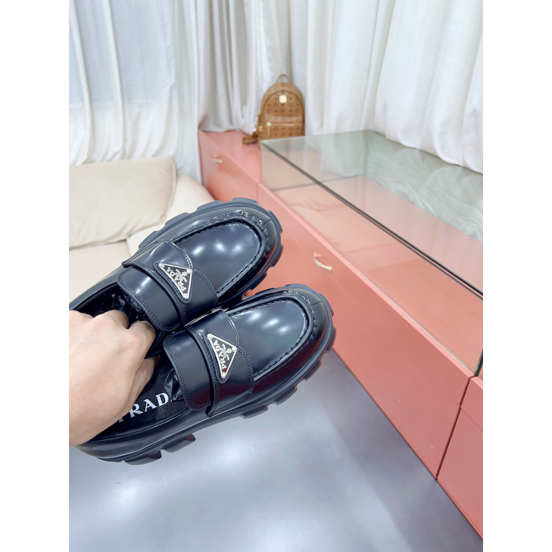 Pra*a monolith polished leather slip-ons black