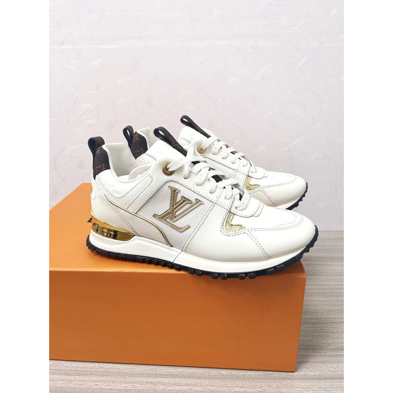 l**is V*t*n run away leather trainers white and gold