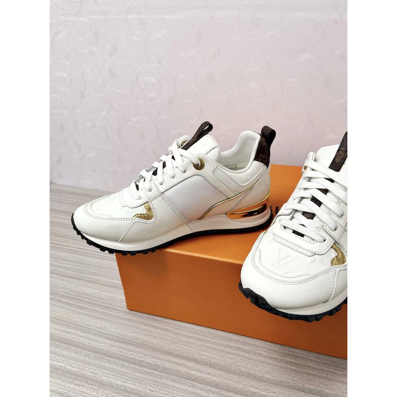 l**is V*t*n run away leather trainers white and gold