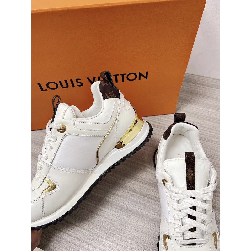 l**is V*t*n run away leather trainers white and gold