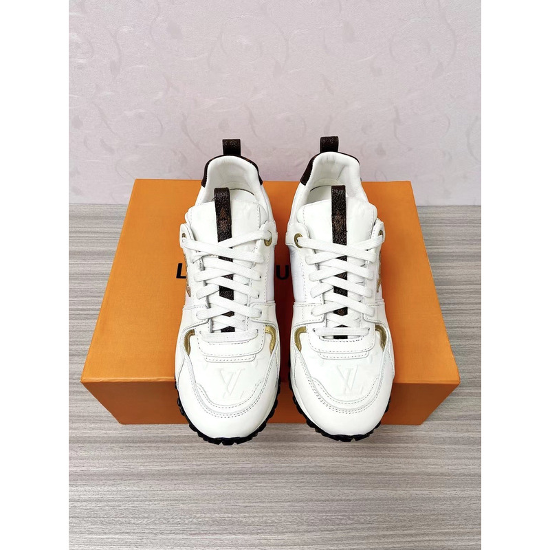 l**is V*t*n run away leather trainers white and gold