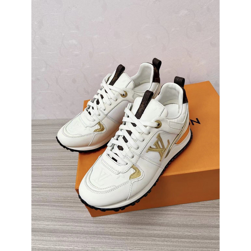 l**is V*t*n run away leather trainers white and gold