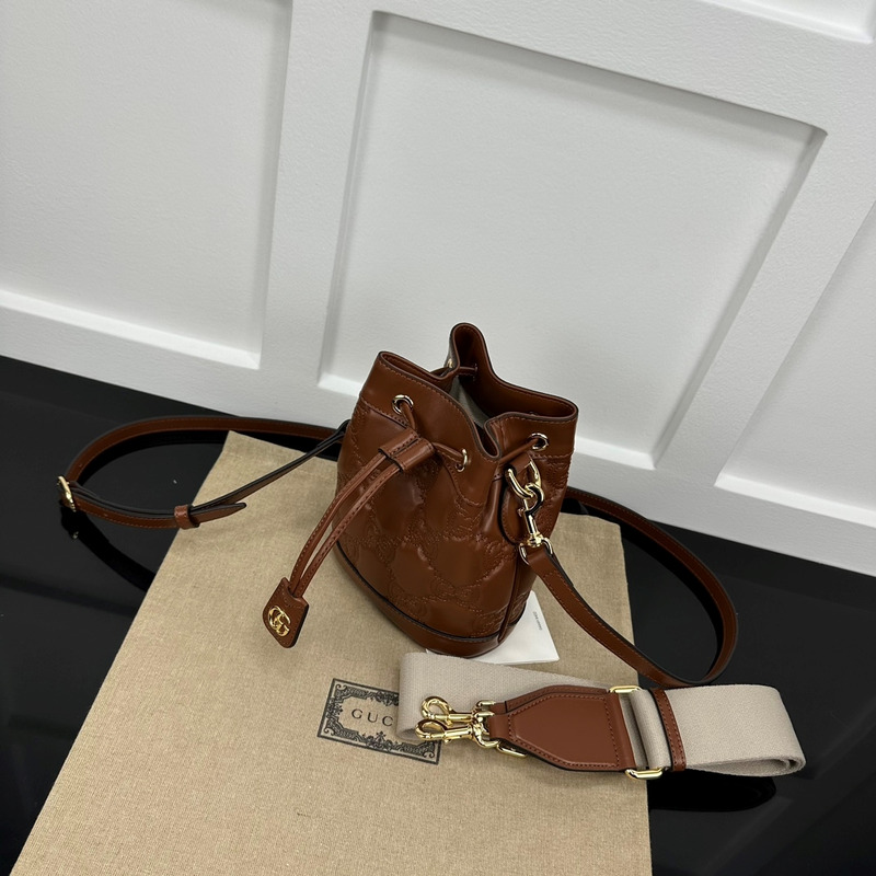 G*u*i gg matelassé leather bucket bag brown