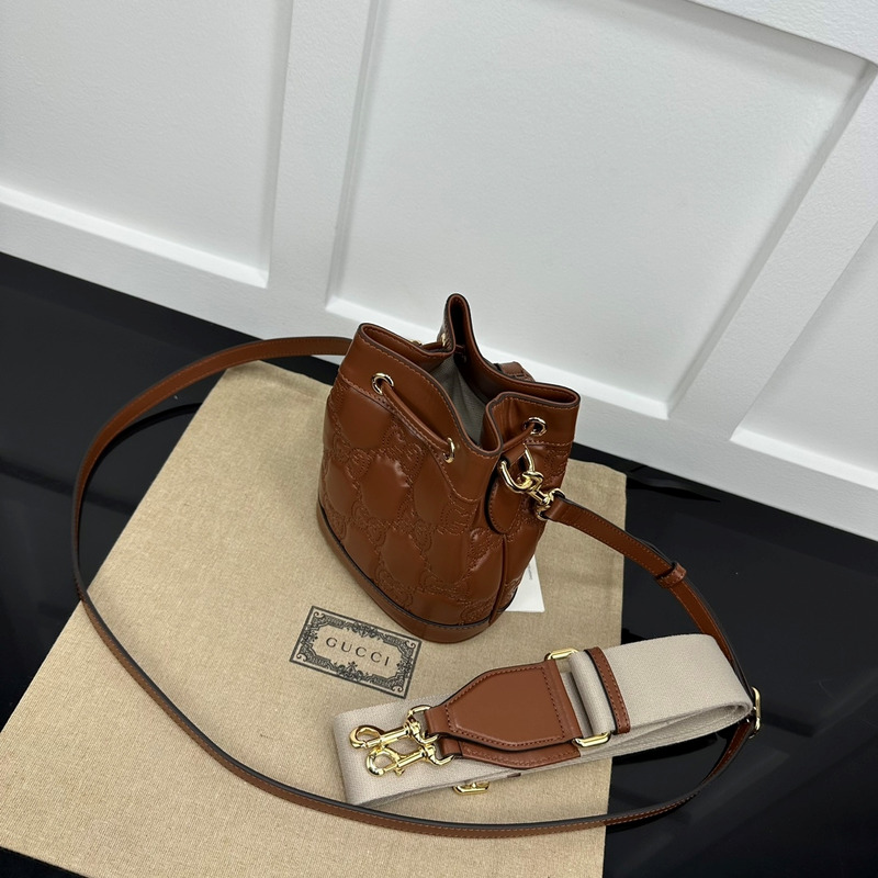 G*u*i gg matelassé leather bucket bag brown