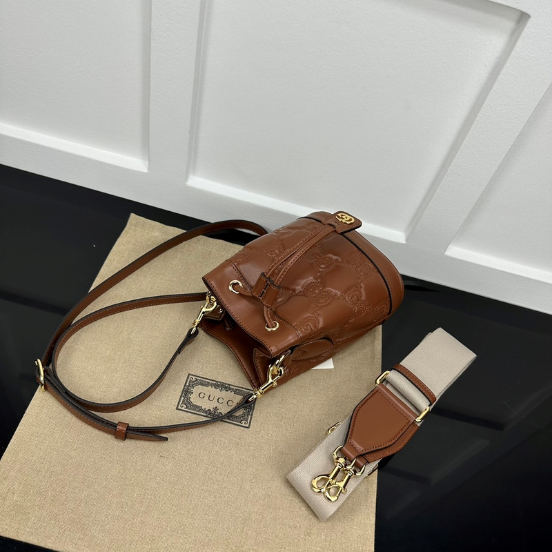 G*u*i gg matelassé leather bucket bag brown