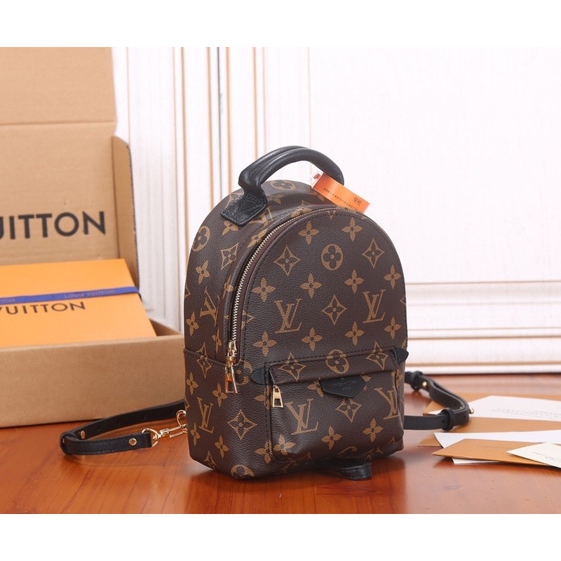 l**is V*t*n monogram canvas mini palm springs backpack