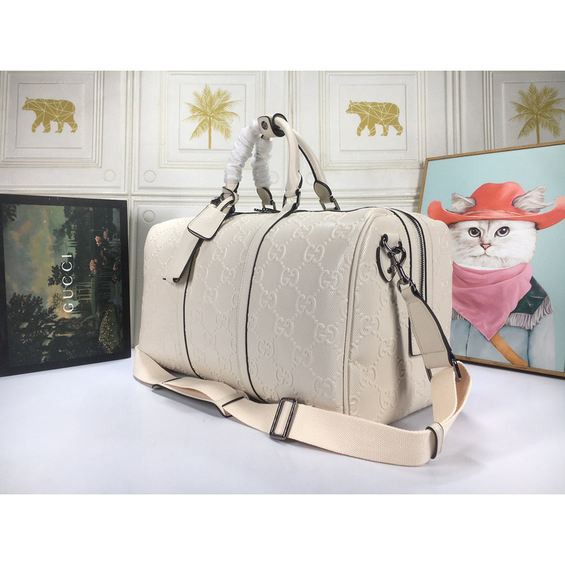 G*u*i gg print embossed duffle bag white leather