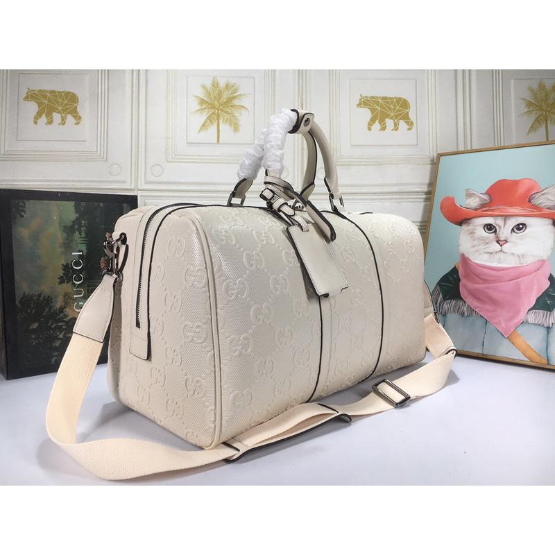 G*u*i gg print embossed duffle bag white leather