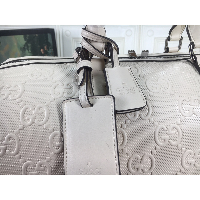 G*u*i gg print embossed duffle bag white leather