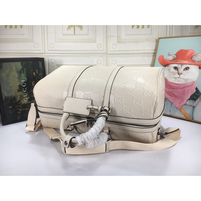 G*u*i gg print embossed duffle bag white leather