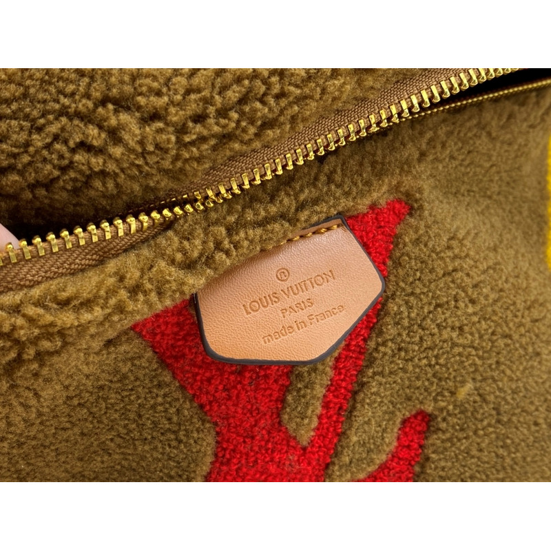 l**is V*t*n monogram shearling bumbag brown with red logo