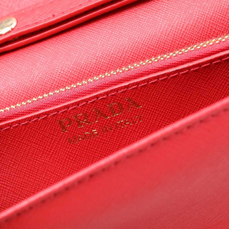 Pra*a saffiano leather mini bag red