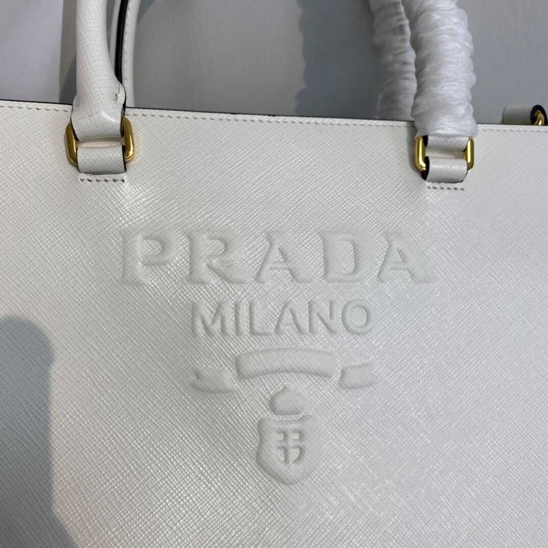 Pra*a medium saffiano leather handbag white