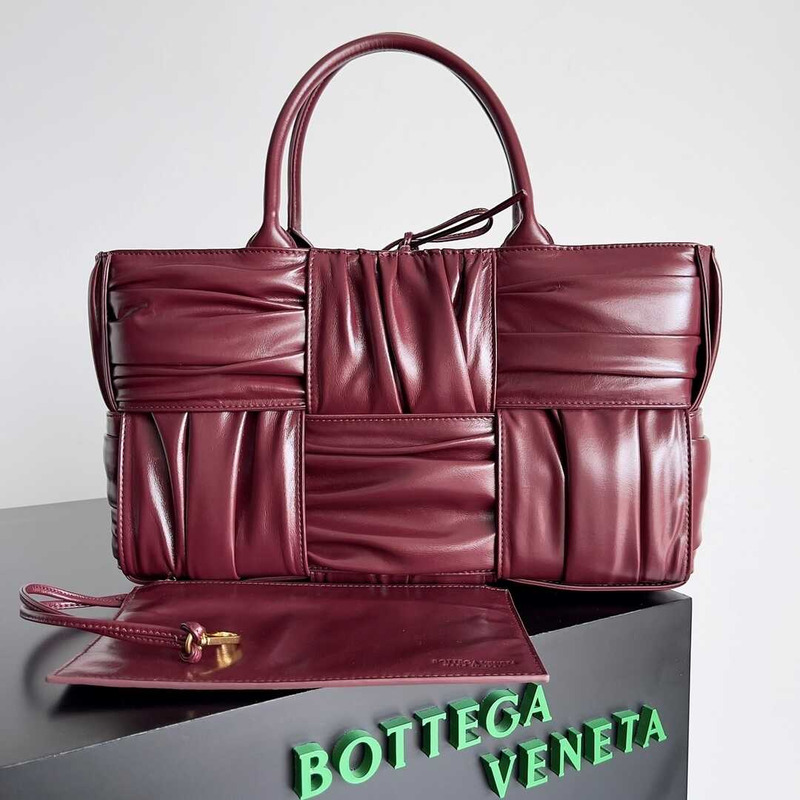 Bo*te*ga ve*ne*ta small arco tote burgundy red