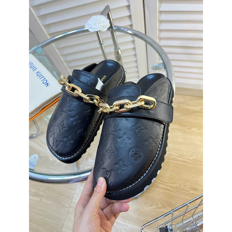 l**is V*t*n fireplace chain in black loafers