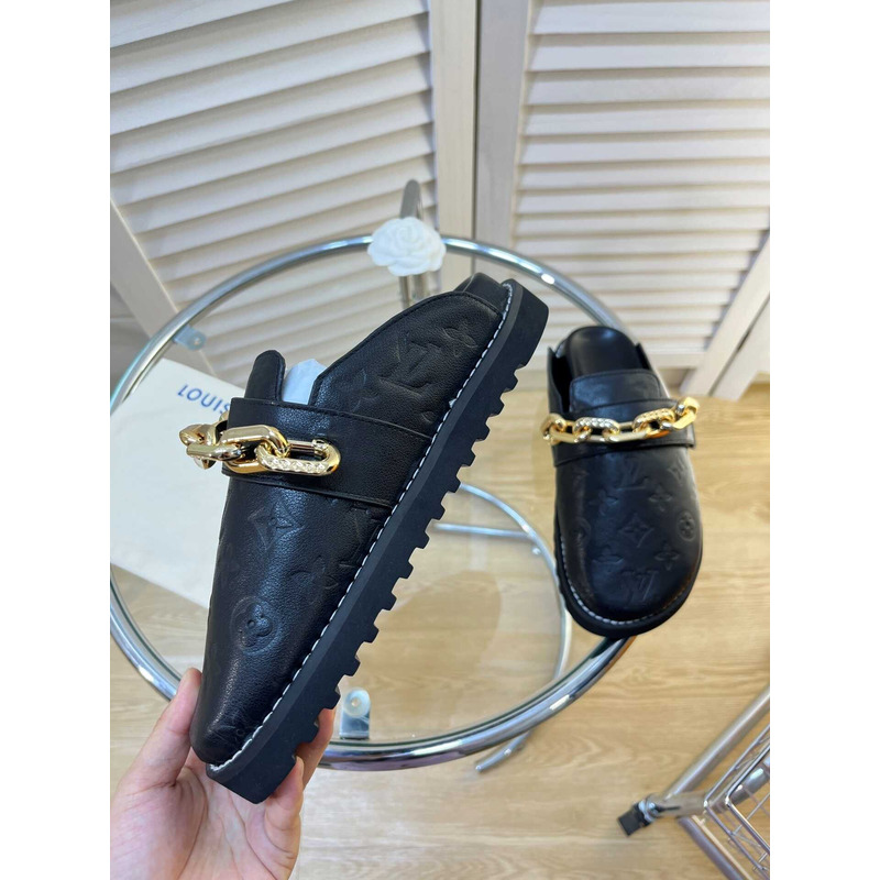 l**is V*t*n fireplace chain in black loafers