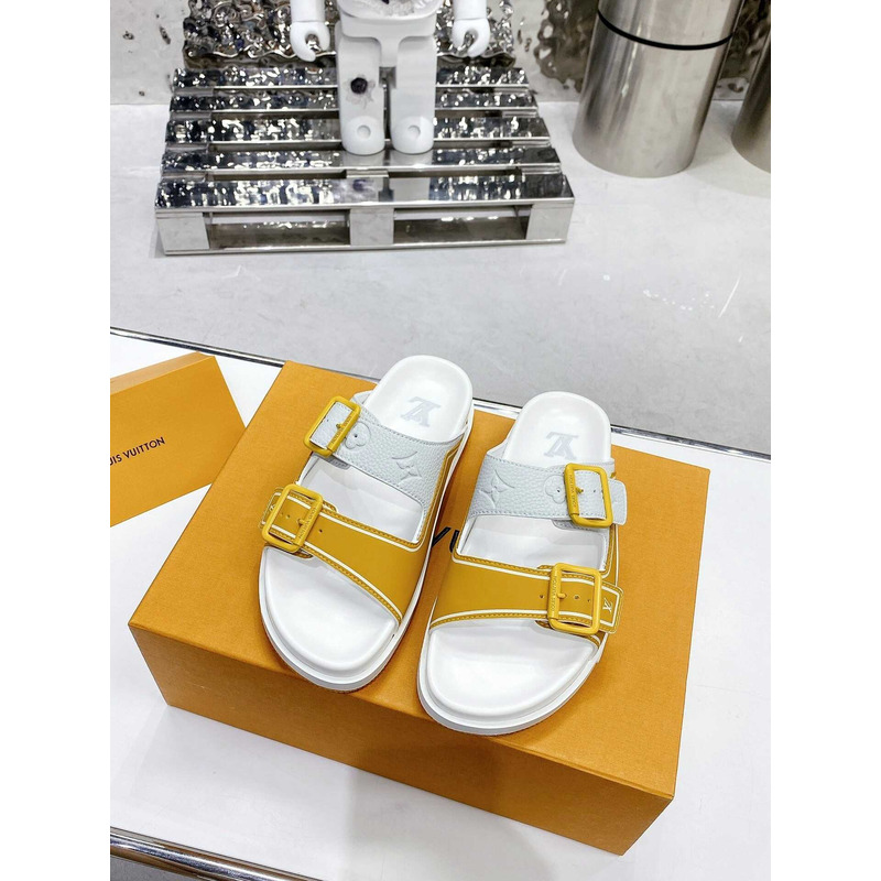 l**is V*t*n leather sandals white