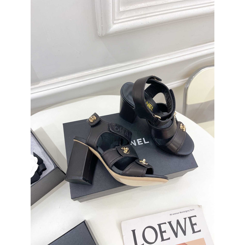 Ch*el logo turnlock black sandals