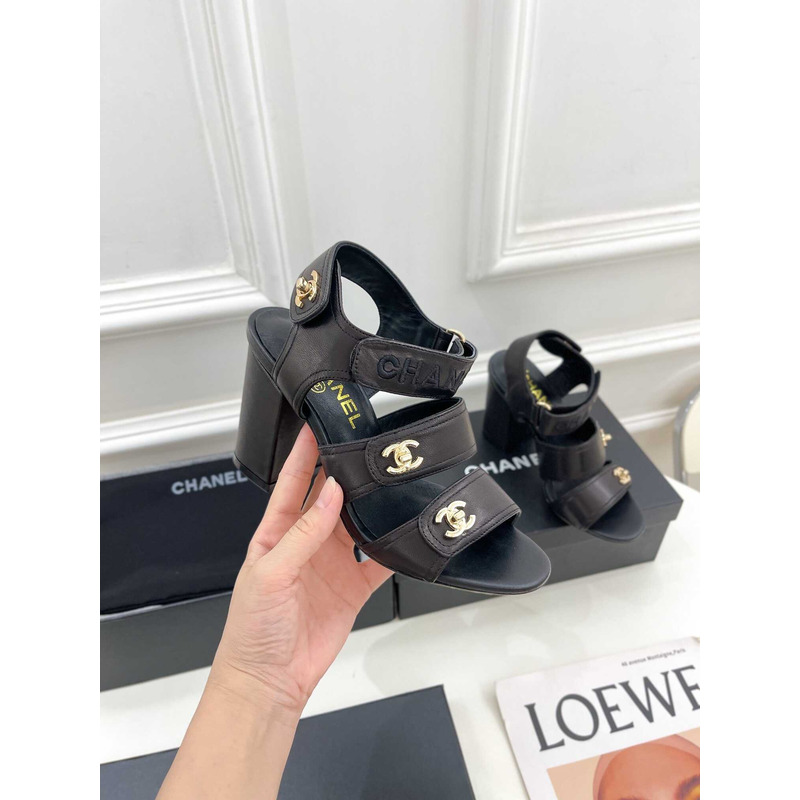 Ch*el logo turnlock black sandals