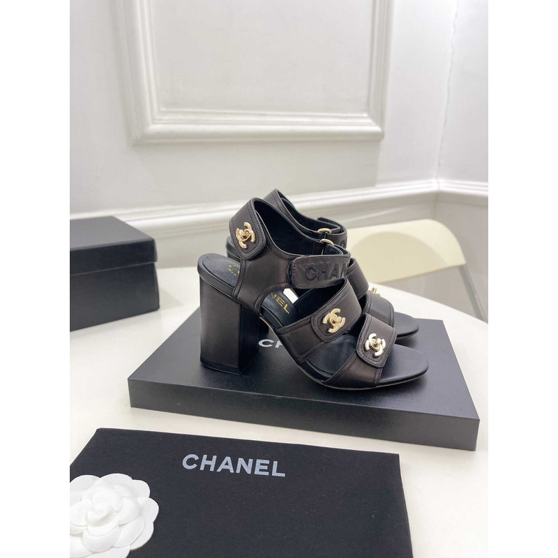 Ch*el logo turnlock black sandals