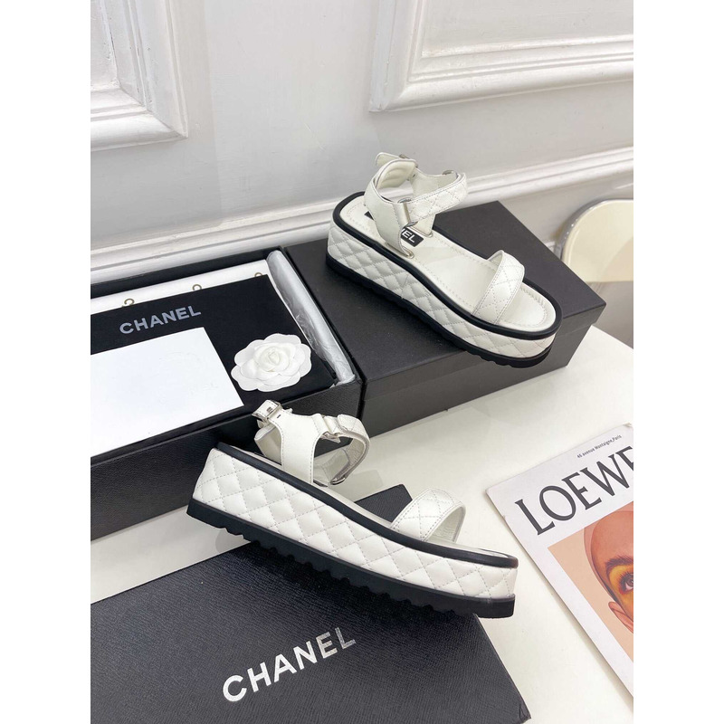 Ch*el black leather sandals in white