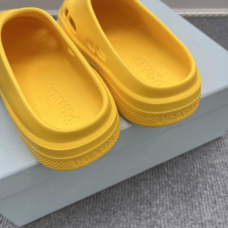 Pra*a foam rubber mules yellow