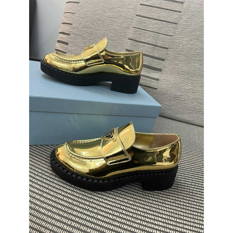 Pra*a triangle logo metallic loafers gold