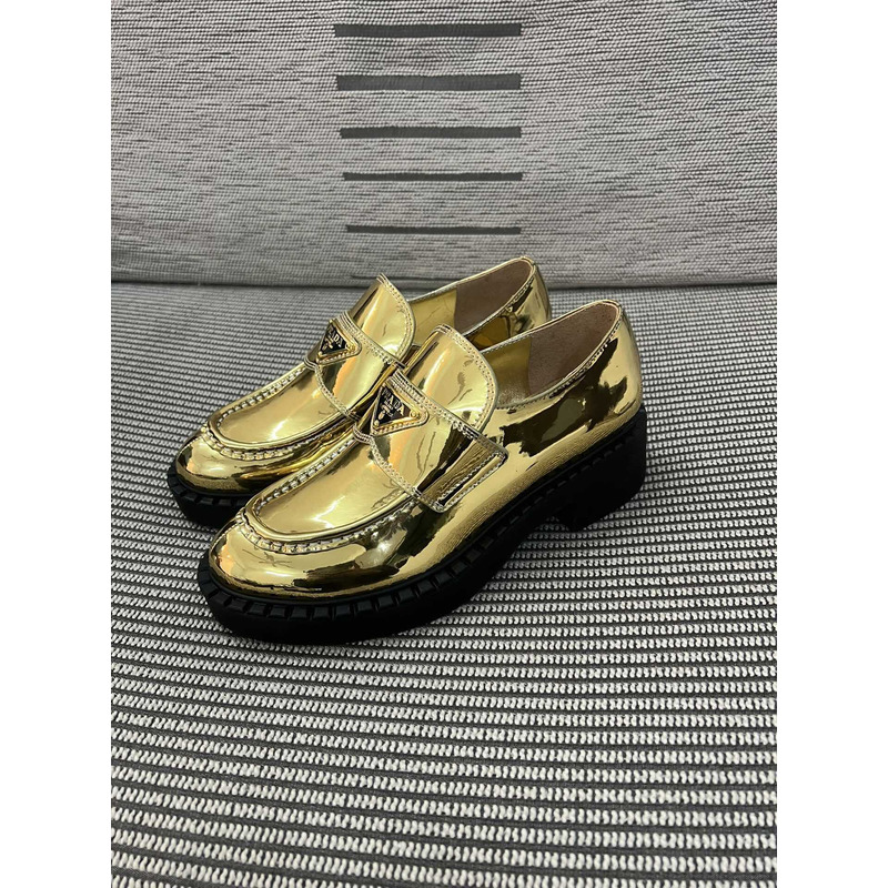 Pra*a triangle logo metallic loafers gold