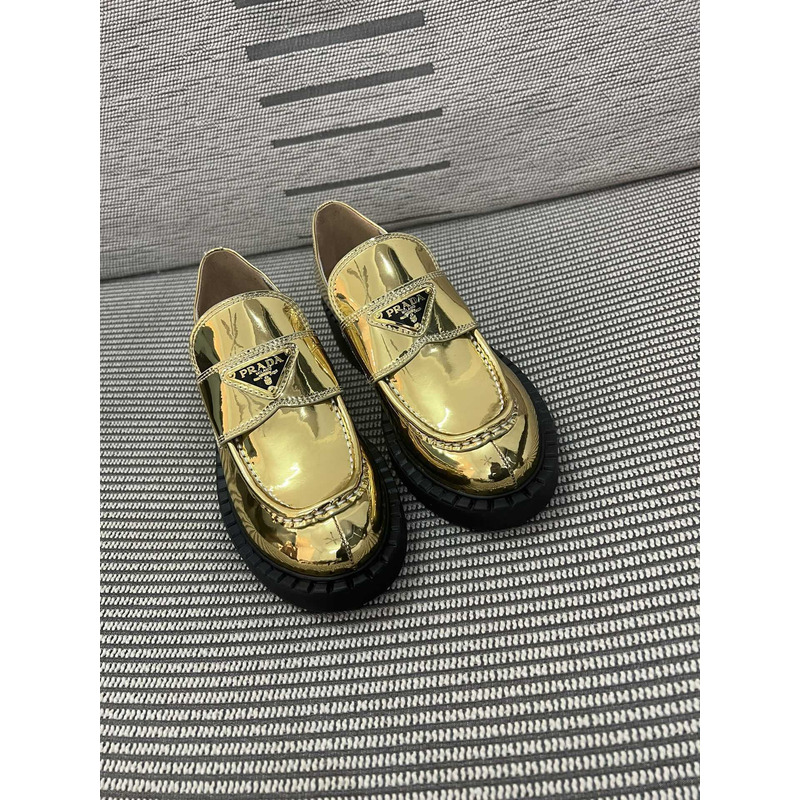 Pra*a triangle logo metallic loafers gold