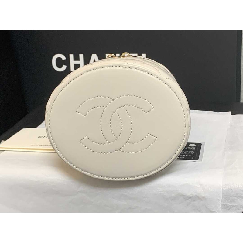 Ch*el mini top handle vanity case white shiny lambskin gold hardware