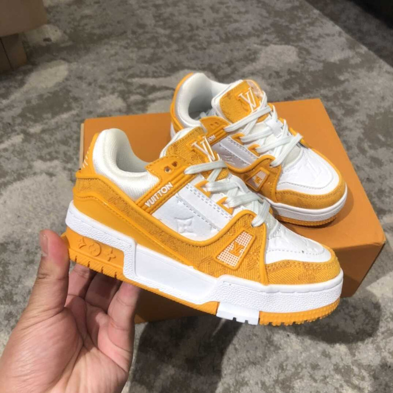 l**is V*t*n kids trainer line sneakers orange