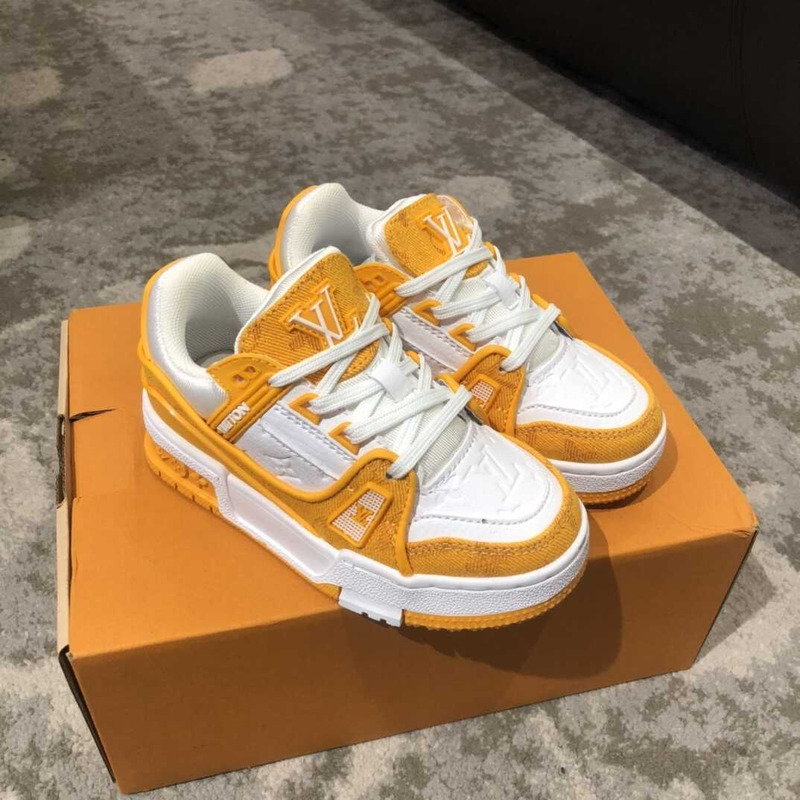 l**is V*t*n kids trainer line sneakers orange