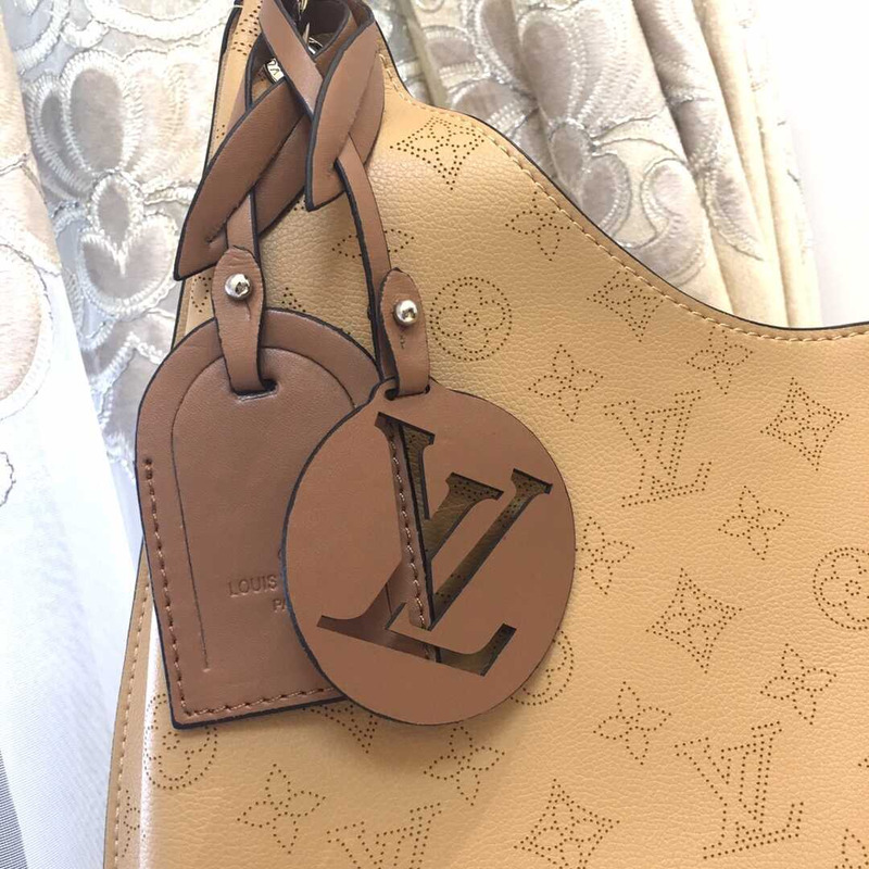 l**is V*t*n carmel mahina leather bag