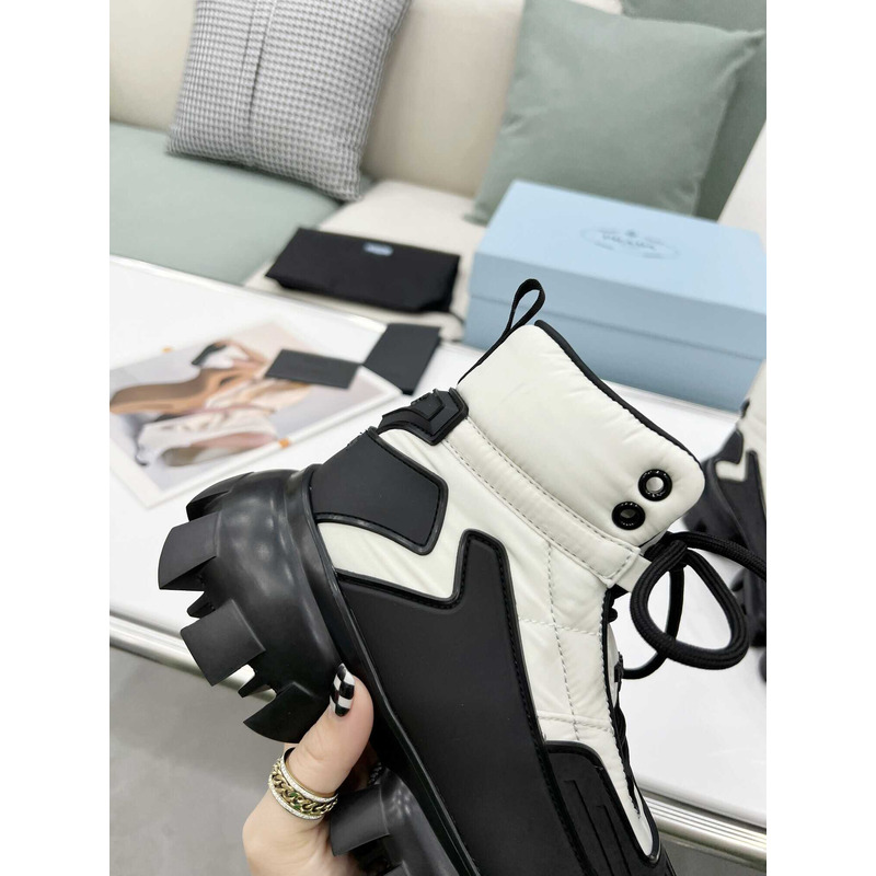 Pra*a cloudbust thunder high top sneakers black and white