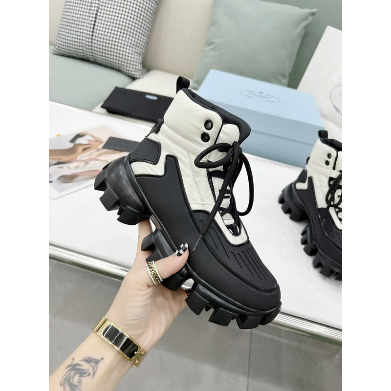 Pra*a cloudbust thunder high top sneakers black and white