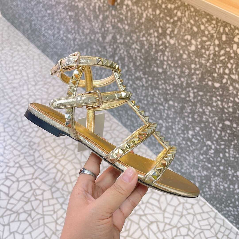 Valentino Rockstud No Limit Ankle Strap Sandals In Gold