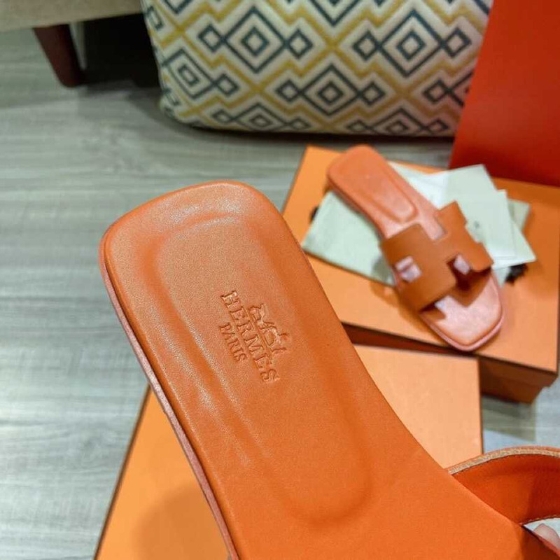 H**mes orange leather sandal