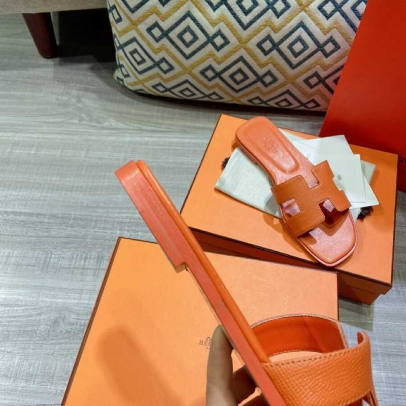 H**mes orange leather sandal