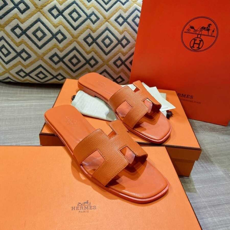 H**mes orange leather sandal