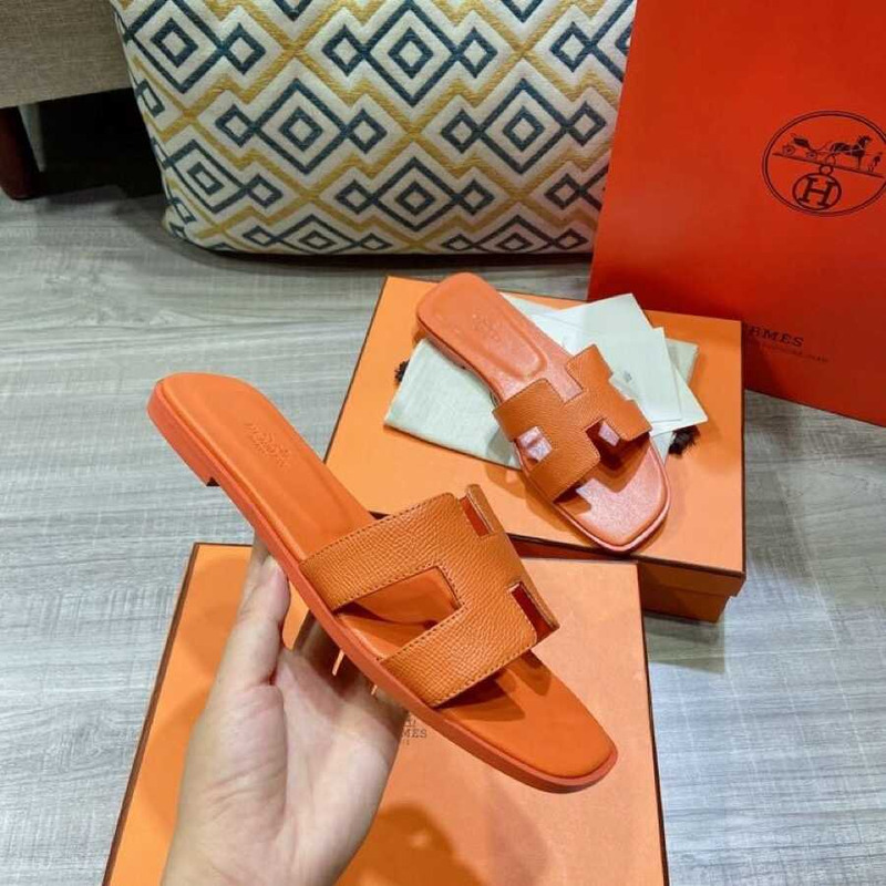 H**mes orange leather sandal