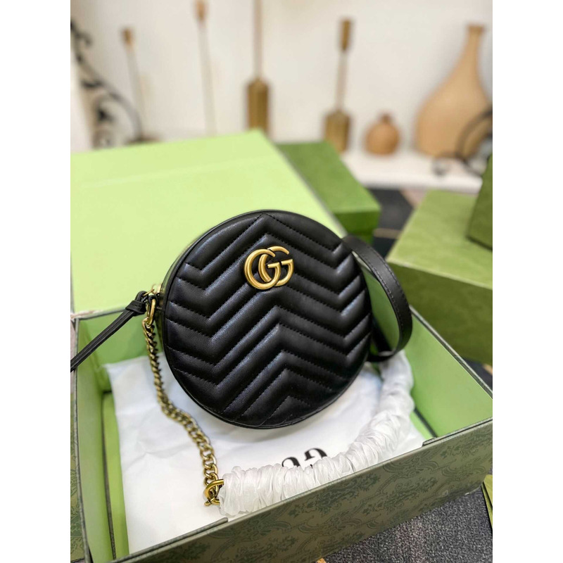 G*u*i black marmont round cross bag