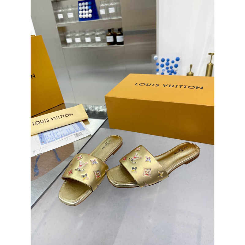 l**is V*t*n revival flat mule slides gold