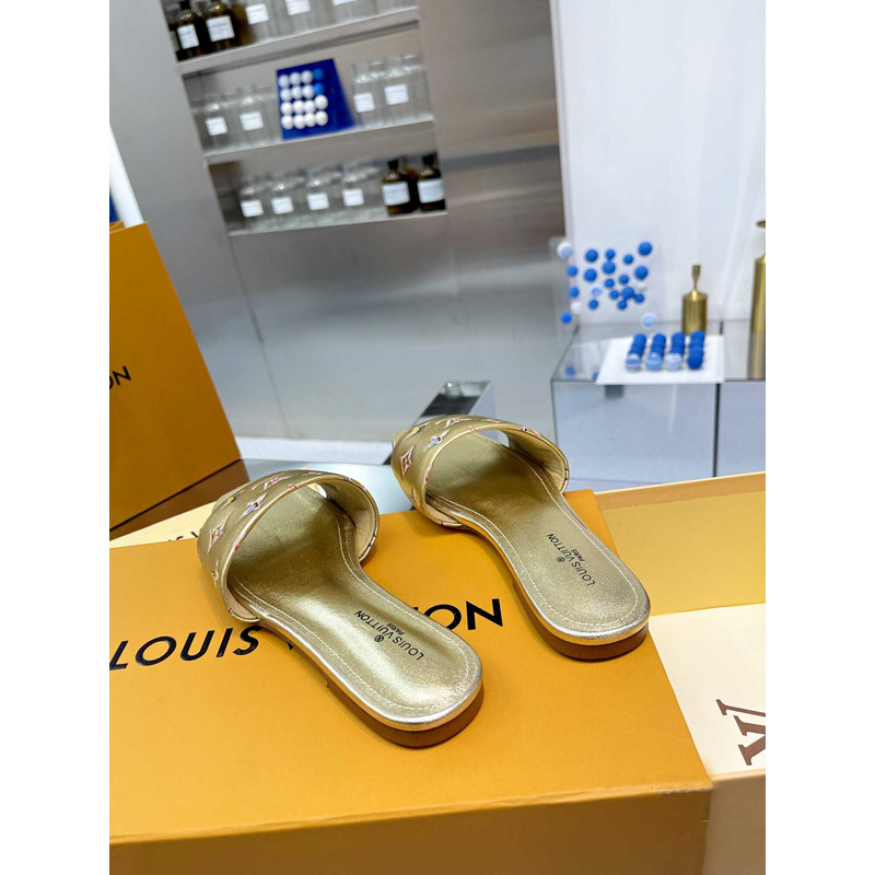 l**is V*t*n revival flat mule slides gold