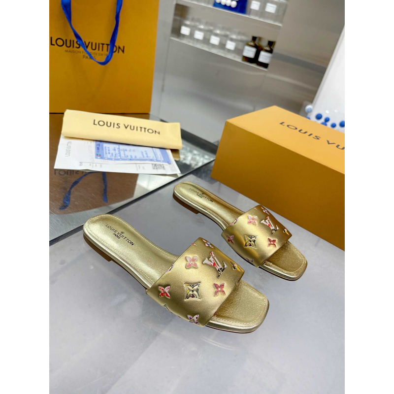 l**is V*t*n revival flat mule slides gold