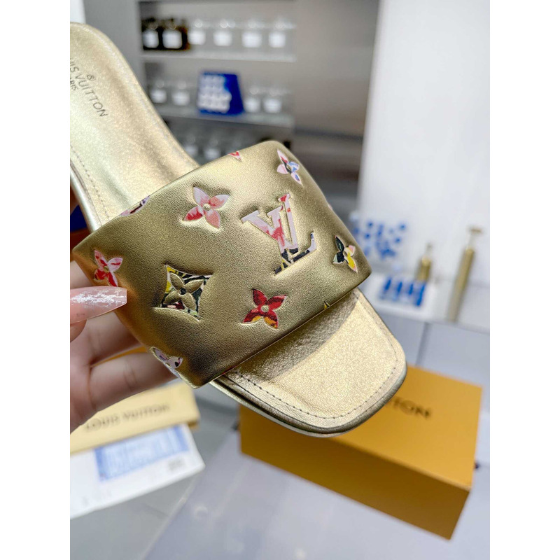 l**is V*t*n revival flat mule slides gold