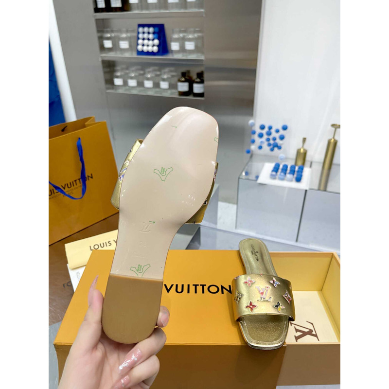 l**is V*t*n revival flat mule slides gold